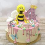 tort drip cake z pszczółką mają