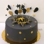 czarno złoty tort z balonikami