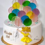 tort z dziewczynką i balonikami lizakami