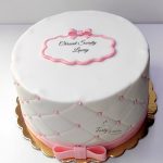 tort na chrzest biało różowy
